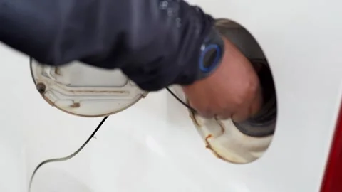 Close up of hand Opening Petrol Cap. Stock Footage 321528295