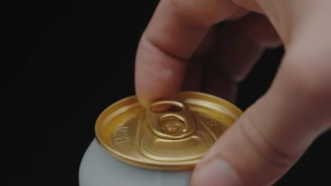 Close up. a hand opening soda or beer can. Can pull tab opening 100fps Stock Footage 171546018