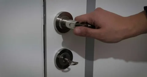 Close up hand opens the door Stock Footage 232316196