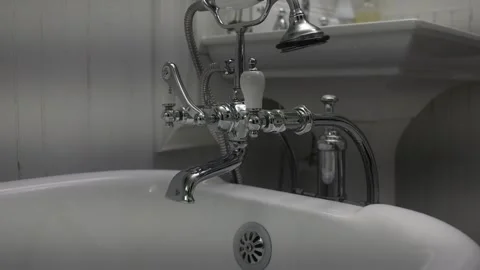 Close-Up of Hand Operating Fancy Water Faucet with Dripping 02 Video stock 289630895
