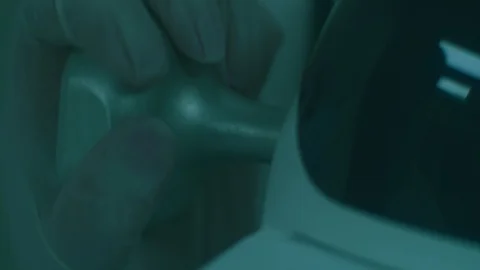Close up of hand operating a machine Stock Footage 105819745
