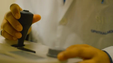 Close up of hand operating a machine Stock Footage 105820256