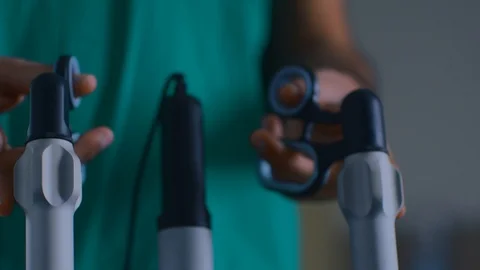 Close up of hand operating a machine Stock Footage 105820264