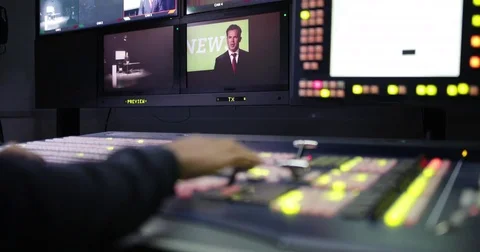 Close-up of hand operating TV control room technology Stock Footage 82121163