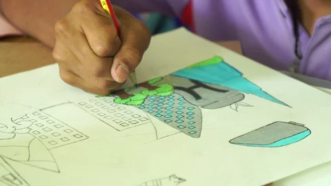 Close up hand paint  on  book Stock Footage 106576993