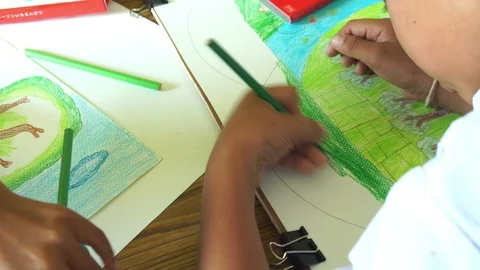 Close up hand paint  on  book Stock Footage 106577437