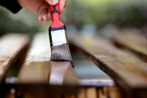 Close-up of a hand with paintbrush 스톡 사진