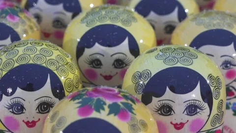 Close-up of hand-painted Souvenirs, standing under the snow Stock Footage
