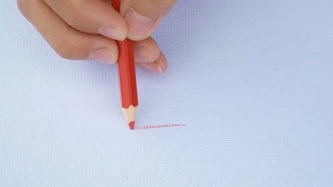 Close up hand of painting Clouds, rain and sun on white paper background.  Stock Footage 106105545