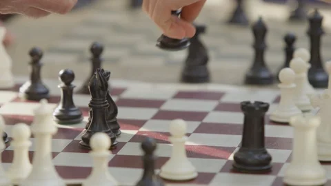Close-up of hand of a person playing chess Stock Footage 103428051