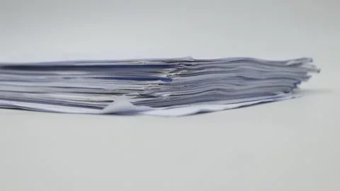 Close up of hand picking up a stack of papers Stock Footage 318734766
