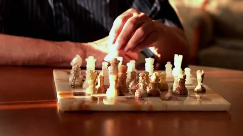 Close-up of hand playing chess, super slow motion Видео 101382619