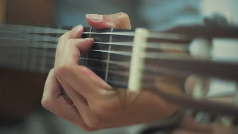 Close-up hand Playing guitar Stock Footage 136445311