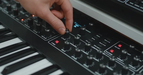 Close-up of hand playing with knobs 動画素材 129870389