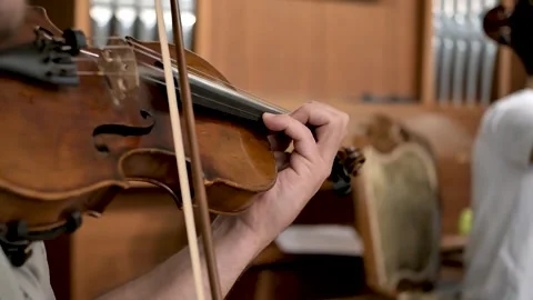 Close-up of hand playing violin indoors Stock Footage 314943645