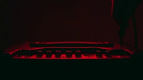 Close up of Hand Plug In and Out Aux and Power On and Off of Amplifier Vídeo Stock 124087255