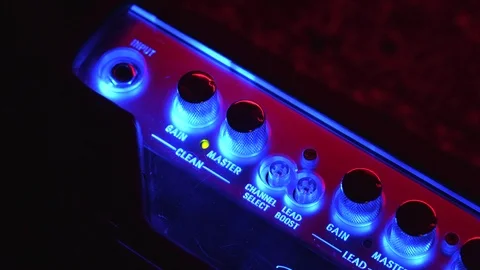 Close up of Hand Plug in Aux in Modern Amplifier Stock Footage 124087347