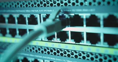 Close-up of hand plugging Ethernet cable... | Stock Video | Pond5