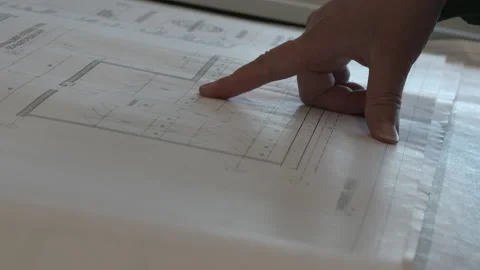 Close up of hand pointing architect plan Stock Footage 194607712
