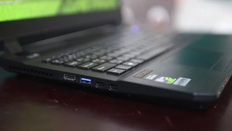 Close up hand pointing at USB and other I/O port of modern gaming laptop Stock-Footage 102192133