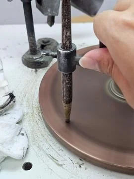 Close up of Hand Polishing a Gemstone on a Professional Lapidary Machine Stock Photos