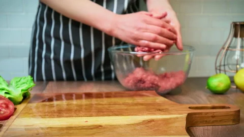 Close-up hand-pressed steak in 4K. Stock Footage 153728539