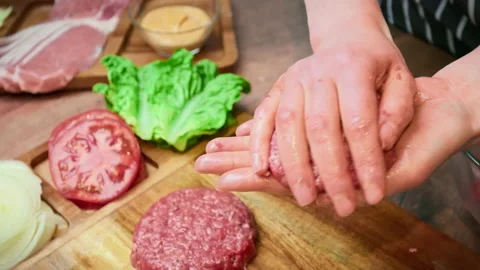 Close-up hand-pressed steak in 4K. Video stock 153729001