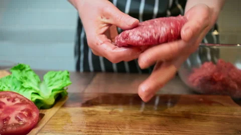 Close-up hand-pressed steak in 4K. Video stock 153729036