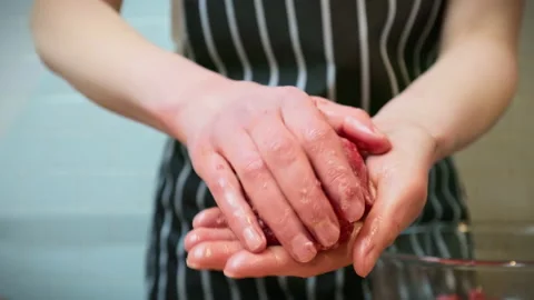 Close-up hand-pressed steak in 4K. Video stock 153729097