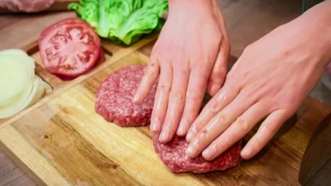 Close-up hand-pressed steak in 4K. Video stock 153729249