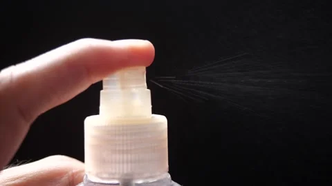 Close-up of Hand presses a button and spray the spray in white plastic Stock-Footage 144227069