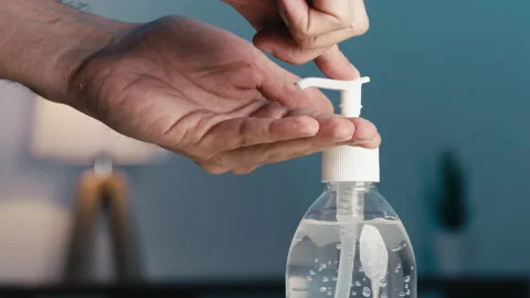 Close up of hand presses sanitizing gel Stock Footage 172348910