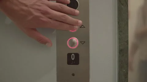 Close up hand pressing Elevator button. Elevator call button. Stock Footage 287610552