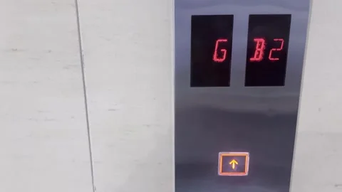 Close Up of Hand Pressing Elevator Button in Office Building Stock Footage 336930253