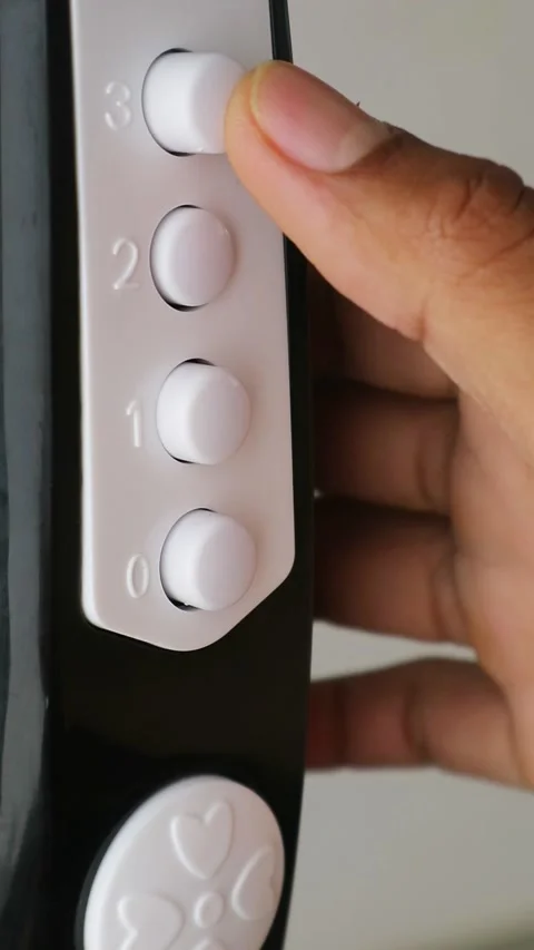 Close Up Hand Pressing Numbered Control Button On Electronic Device 動画素材 334359951