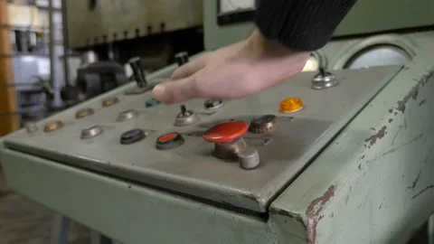 Close-up of hand pressing the red button on the desktop control panel. Stock Footage 87725248