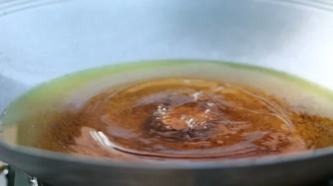 Close up hand Process of cooking fish cakes. Cooking in a wok. Stock Footage 62234918