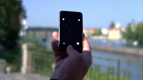 Close Up On Hand Of Professional Man On Mobile Phone on street Stock Footage 130284015