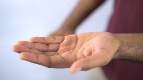 Close-up hand pushing plastic bottle pump with alcohol hand gel Video stock 128349865