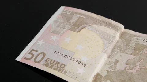 Close-Up Of The Hand Puting 50 Euros Stock Footage 169935798