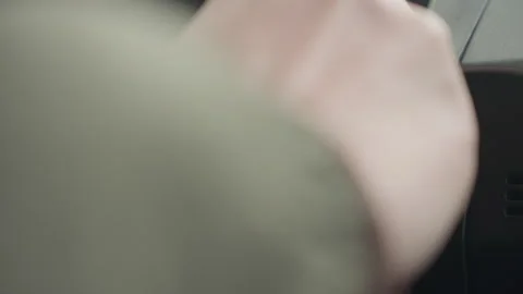 Close up hand putting car key into ignition to start engine Stock Footage 310180064