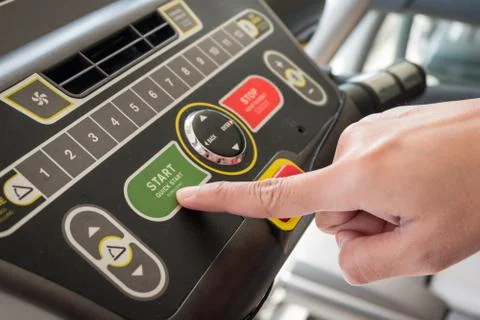 Close up of hand putting control start machine exercise Stock Photos