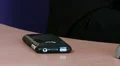 Close up of hand putting phone down on table HD Footage