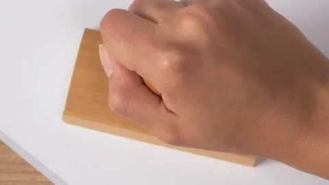 Close up hand putting stamp closed on paper concept bureaucracy Stock Footage 152449840
