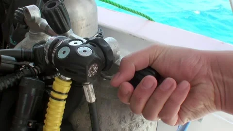 Close-up hand regulates scuba diving balloon in diving equipment on yacht. Stock Footage 263836390