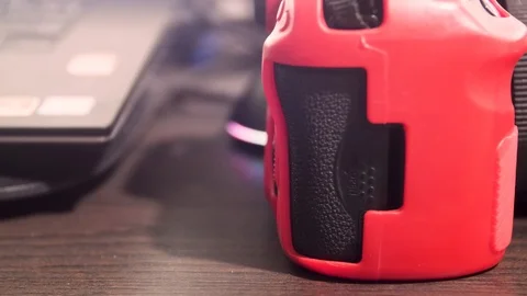 Close up of hand removing SD Card from a DSLR Camera and insert into a pc Stock-Footage 107907570