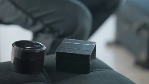 Close up of hand returning foam applicator to makeup box Stock Footage 308659865