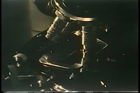 Close-up of hand rotating 1970s microscope 스톡 동영상 11354209