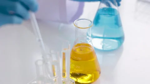 Close up hand of scientist or technician in laboratory test chemistry liqui.. Stock Footage 243417501