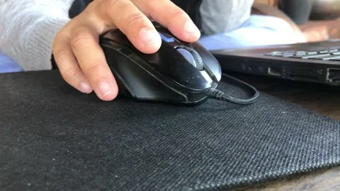 Close up of hand scrolling and clicking Mouse button on a Mousepad Stock Footage 295196467